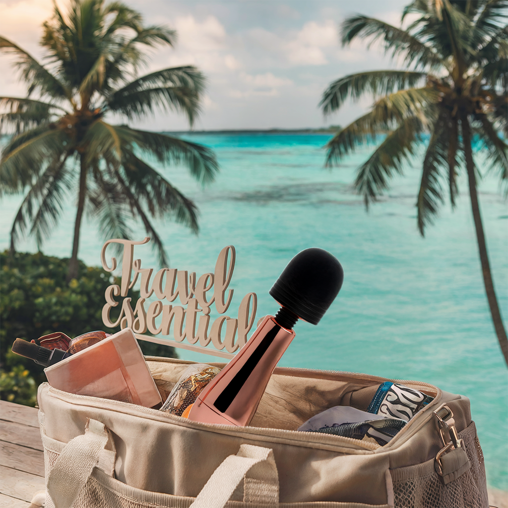 Compact Lush Chloe Mini Massager Wand tucked inside a lady's bag, showcasing its travel-friendly size and portability for pleasure on the go.