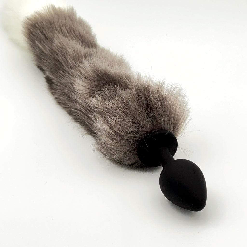 Foxy Silicone Butt Plug with shimmering faux-fox tail, ready to spice up your intimate adventures.