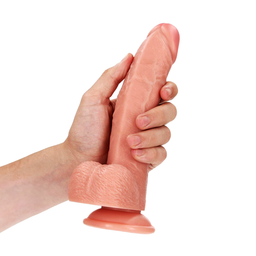 RealRock Curved Dildo with Balls - 20.5cm: A playful and pleasurable addition to your intimate collection.
