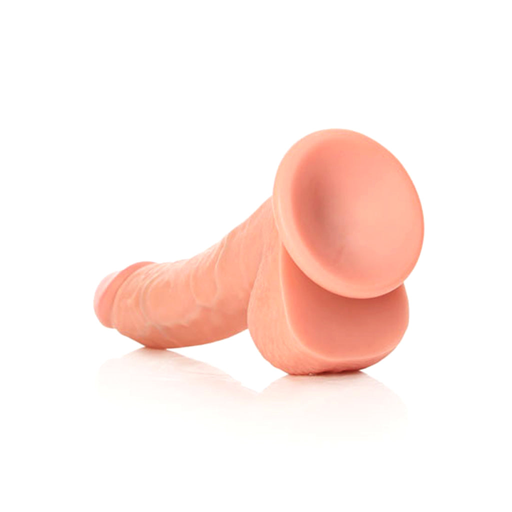 RealRock Curved Dildo with Balls - 20.5cm: A playful and pleasurable addition to your intimate collection.